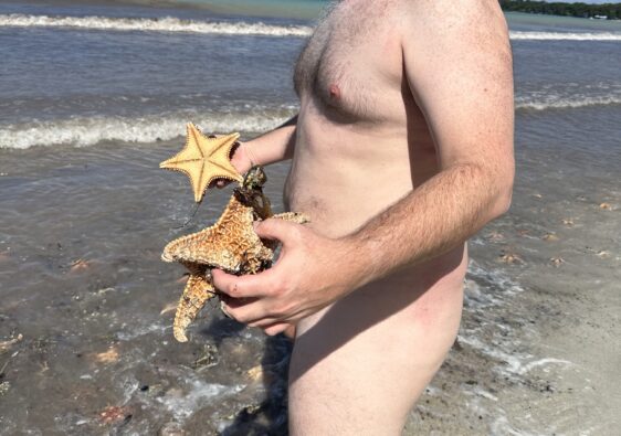Mike's first time naked on a beach!