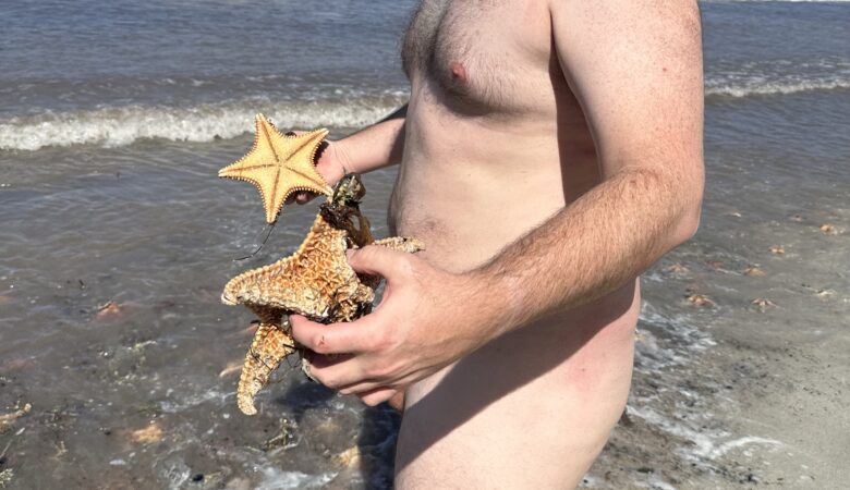 Mike's first time naked on a beach!